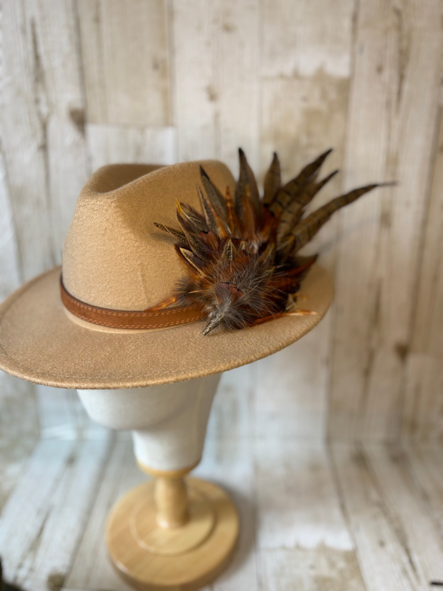 Pheasant feather hat pin.