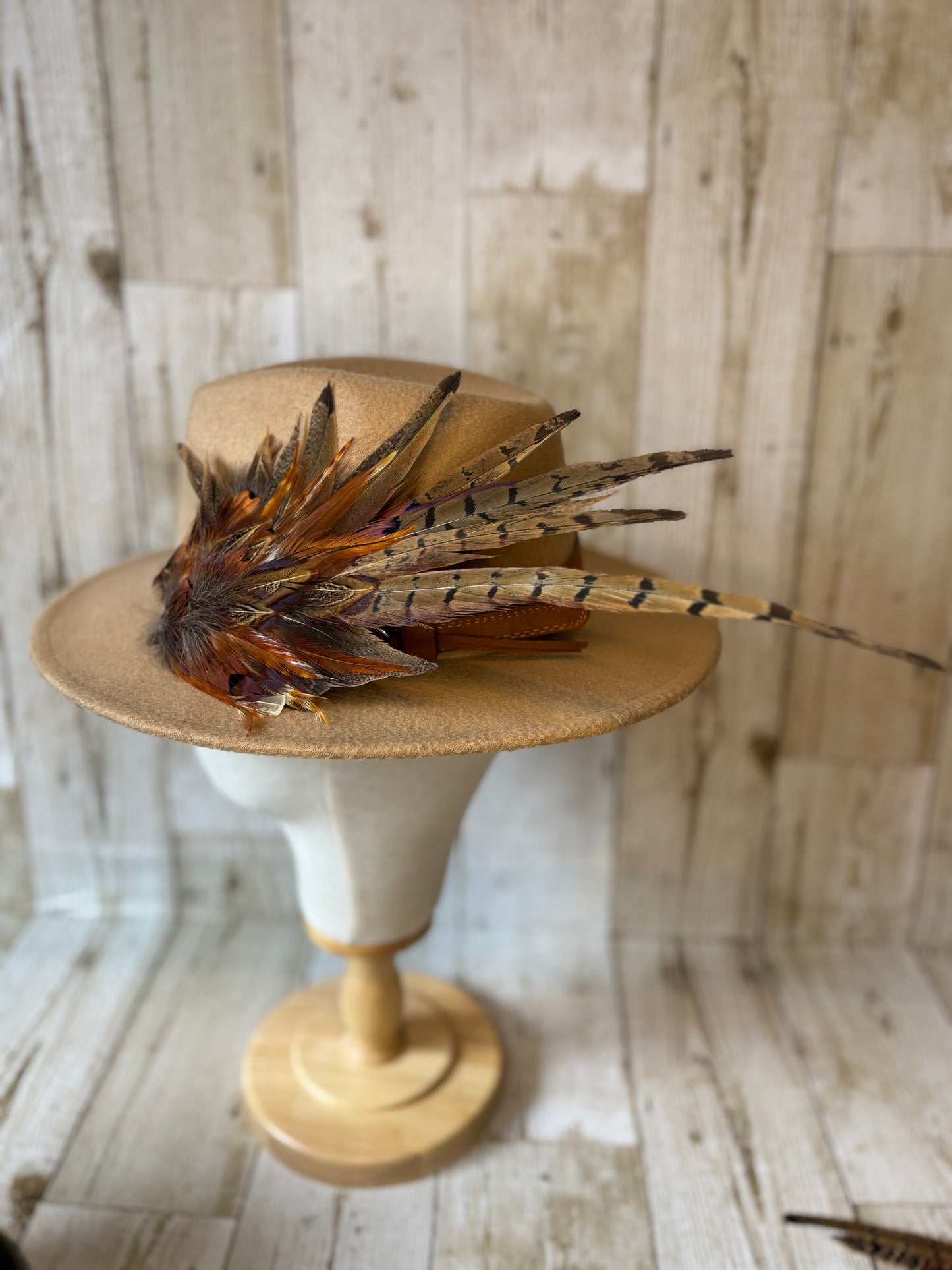 Pheasant feather hat pin.
